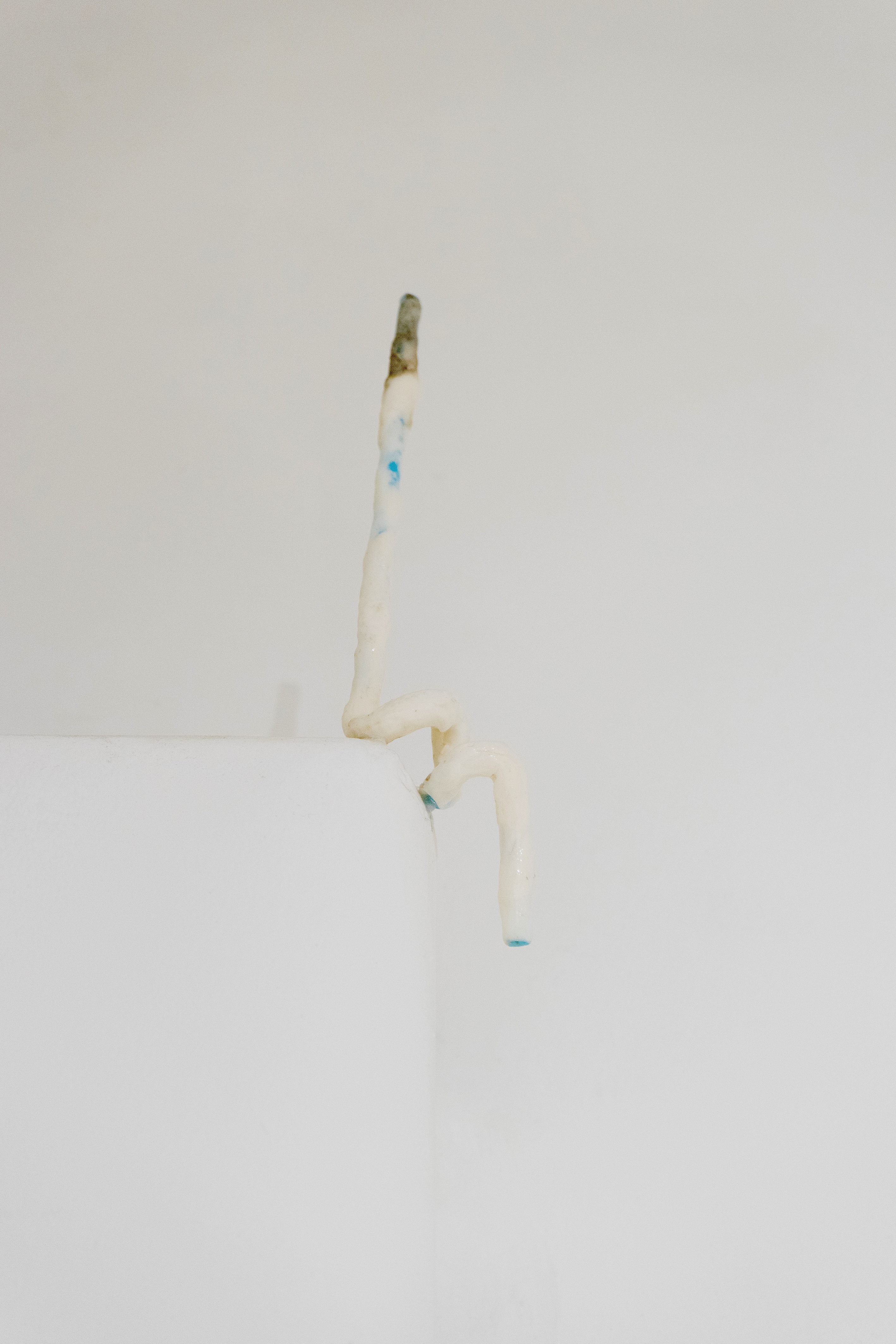 Joel Kirkham, Reclining Straw, 2018, straw, paper clay, glue, varnish and used surfboard wax.